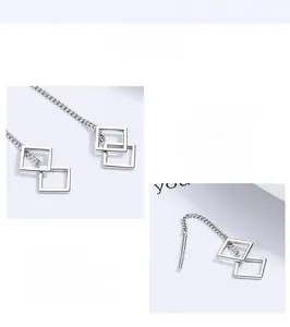 Detailed view of S925 sterling silver hollow rhombus earrings with double square tassel design