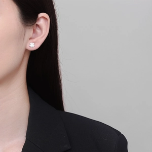 Exquisite 925 sterling silver rose flower stud earrings worn on a model for a chic look
