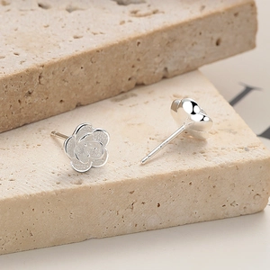 925 sterling silver rose flower stud earrings on textured stone for elegant women