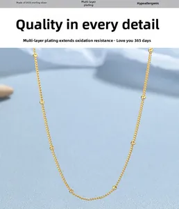 Detailed macro view of S925 sterling silver gold beaded chain with anti-tarnish plating