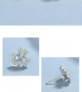Detailed macro view of S925 sterling silver clover stud earring with sparkling cubic zirconia