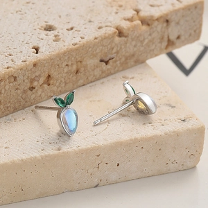 925 sterling silver carrot stud earrings with moonstone and green zircon gems