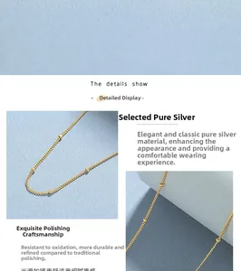 Detail showing the polished 925 sterling silver gold beaded chain necklace texture