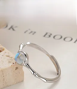 Detailed close-up of S925 sterling silver bamboo texture ring with moonstone gemstone