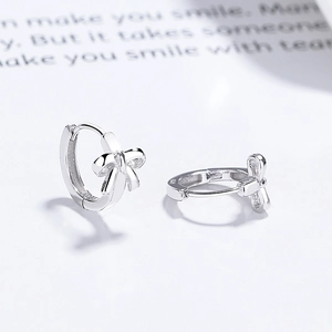 Elegant 925 sterling silver bow hoop earrings with a polished finish and secure clasp