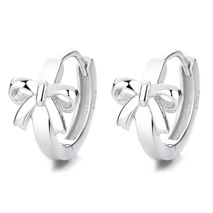 Polished S925 sterling silver bow knot hoop earrings for women on a white background