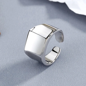 Detailed view of 925 sterling silver striped open ring with a polished square flat top