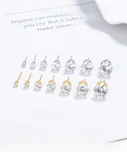 Detail view of 925 silver crown-set cubic zirconia studs in various sizes and shapes
