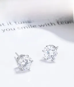 Macro shot of 925 sterling silver six-prong cubic zirconia stud earrings showing details