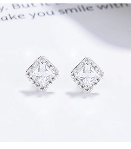 Macro shot of 925 silver square halo stud earrings with princess cut cubic zirconia