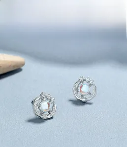Detailed macro view of S925 sterling silver earring featuring moonstone and diamonds