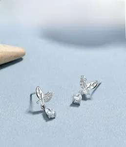 Close-up of S925 sterling silver leaf earrings with drop-shaped zircon inlays
