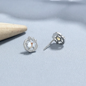 925 silver feather earrings with moonstone in an elegant hollow star design