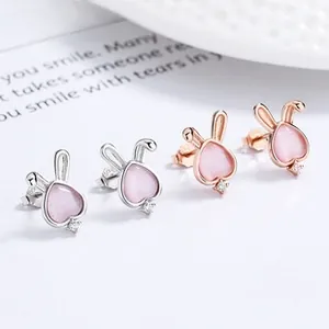 Detail of 925 sterling silver bunny earrings with pink moonstone and zircons