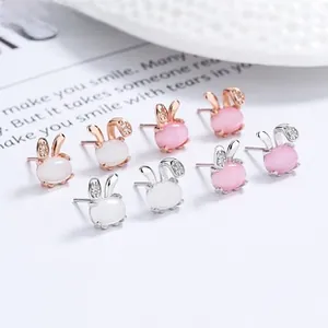 Exquisite rabbit stud earrings set with opal stones and shimmering zircon ear detail