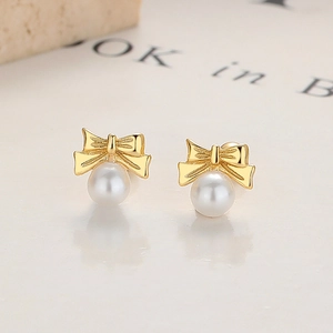 Elegant 925 sterling silver gold bow earrings with round white pearls for women