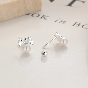 S925 sterling silver bow pearl stud earrings with secure screw back closure