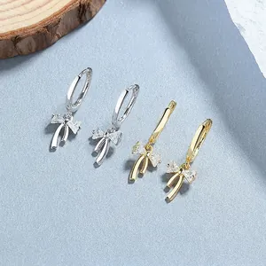 Pendientes de aro con lazo de plata 925 y circonitas en acabados dorado y plateado