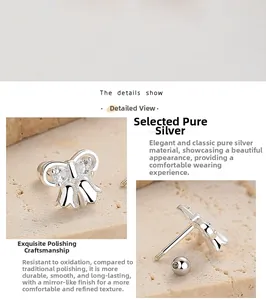 Gros plan sur les boucles d'oreilles muguet en argent 925 avec fermoir à vis sécurisé