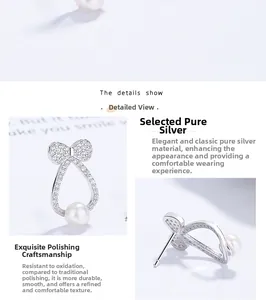 Macro detail of sterling silver bow earrings with micro-pave stones and round pearls