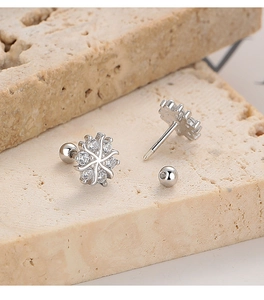 Detail showing the threaded screw-back mechanism of 925 sterling silver snowflake stud earrings