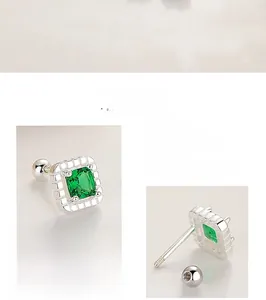 Detail view of 925 silver emerald zircon earrings with secure screw-back design