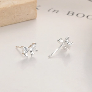 S925 sterling silver bow stud earrings with sparkling heart-shaped cubic zirconia stones