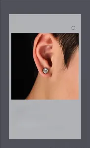 Vue détaillée du clip d'oreille magnétique argenté avec un diamant de zircone