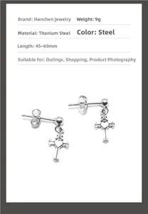 Detailed view of titanium steel cross and heart earrings with size measurements