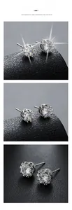 Detailed view of silver star stud earrings with brilliant-cut cubic zirconia and crown back