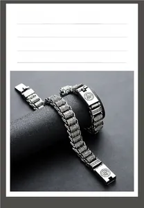 Detail of titanium steel bracelet with relief texture and six-word mantra engraving