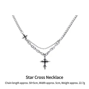 Hip hop style cross pendant necklace with layered chain design and silver-black finish