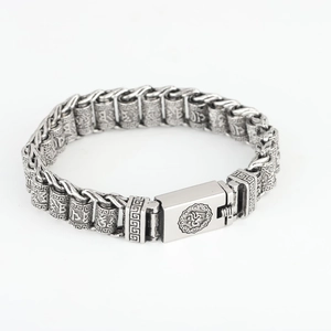 Vintage silver-plated bracelet with engraved mantras and cylindrical prayer beads