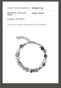 Macro shot of titanium steel chain with marble stone beads showing technical specs