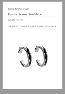 Detail of silver-black ear cuff with vintage rock texture and minimalist C-shape design