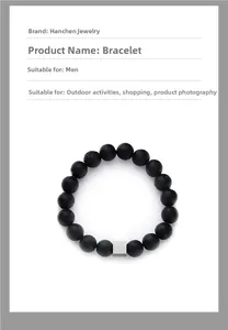 Detailed close-up of volcanic stone bracelet with a geometric silver cube bead