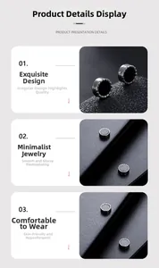 Macro shot of magnetic black stud earring showing textured metal edge and smooth plating