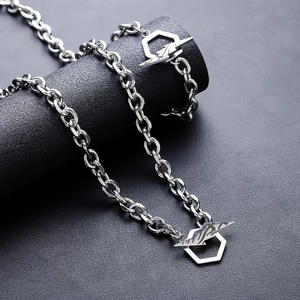 Silver lightning bolt necklace with hexagonal pendant in a bold industrial style design