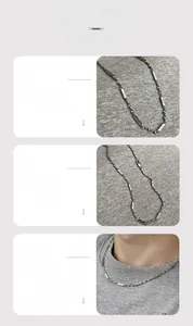 Detail view of silver Mobius chain necklace with starburst design and irregular links
