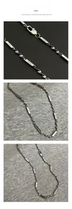 Detail view of Möbius silver chain with engraved star pattern and lobster clasp