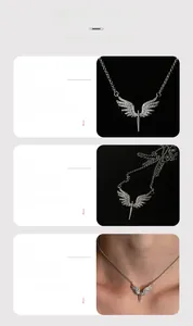 Detailed macro view of angel wing necklace with zircons and on-body pendant fit