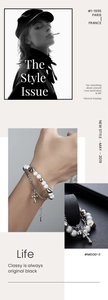 Detail of double-layer bracelet with white pearls, silver chain and cross pendant