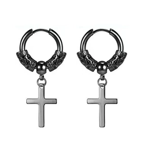 Close-up of black hoop earrings with detailed dragon head relief and hanging cross charms