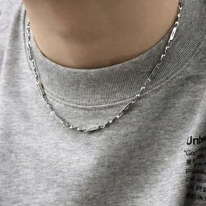 Mobius titanium necklace for men with star engraved plates and twisted link chain
