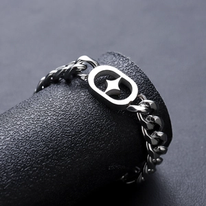 Star pattern titanium steel curb chain bracelet with oval hollow centerpiece