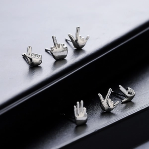 Hip-hop style silver gesture stud earrings set with polished metal finish for men and women
