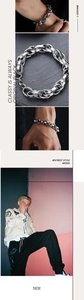 Detailed view of silver titanium steel curb chain bracelet with industrial street style
