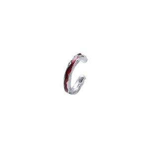 Irregular silver textured ear cuff with vibrant red enamel inlay in minimalist style