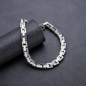 Titanium steel bracelet featuring rectangular textured links and industrial minimalist design