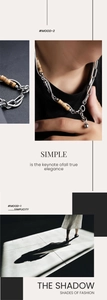 Detailed view of minimalist titanium steel necklace with spliced chains and cylindrical beads
